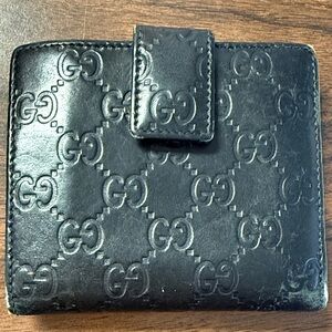 Gucci Black Leather Wallet with Gold Accent